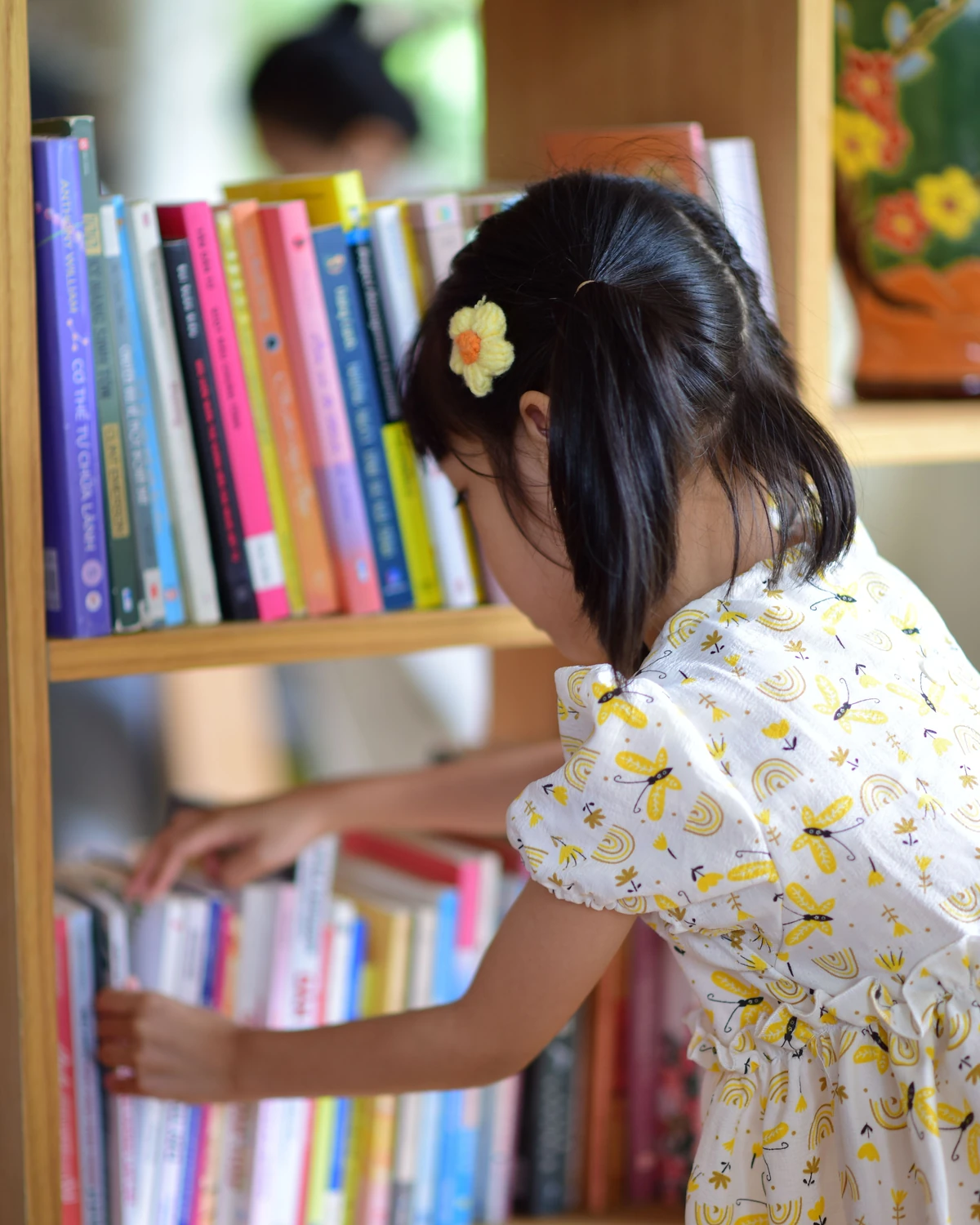 Choosing a book from the shelf